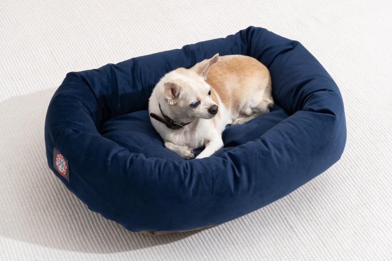 10. Best Friends by Sheri Calming Bolster Dog Bed