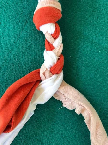 5. DIY T-Shirt and Tennis Ball Dog Rope Toy by Blog by Donna